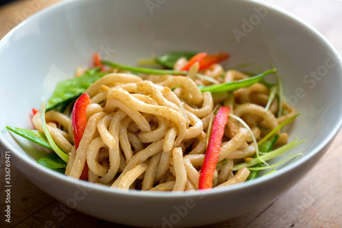 Bowl†of cold sesame noodles with crunchy vegetables