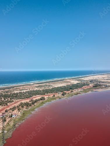 Aerial View of Pink Lake in Senegal, red water by drone © Ada
