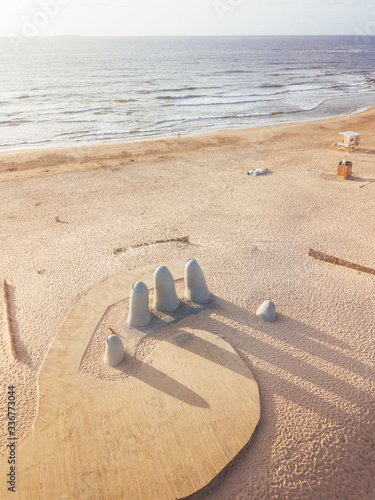 Aerial Top View on La Mano del Punta del Este, The Hand sculpture in Uruguay