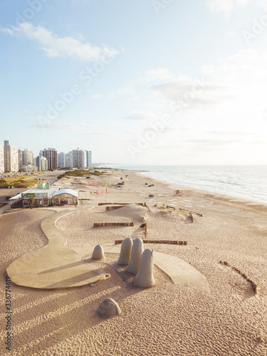 Aerial Top View on La Mano del Punta del Este, The Hand sculpture in Uruguay