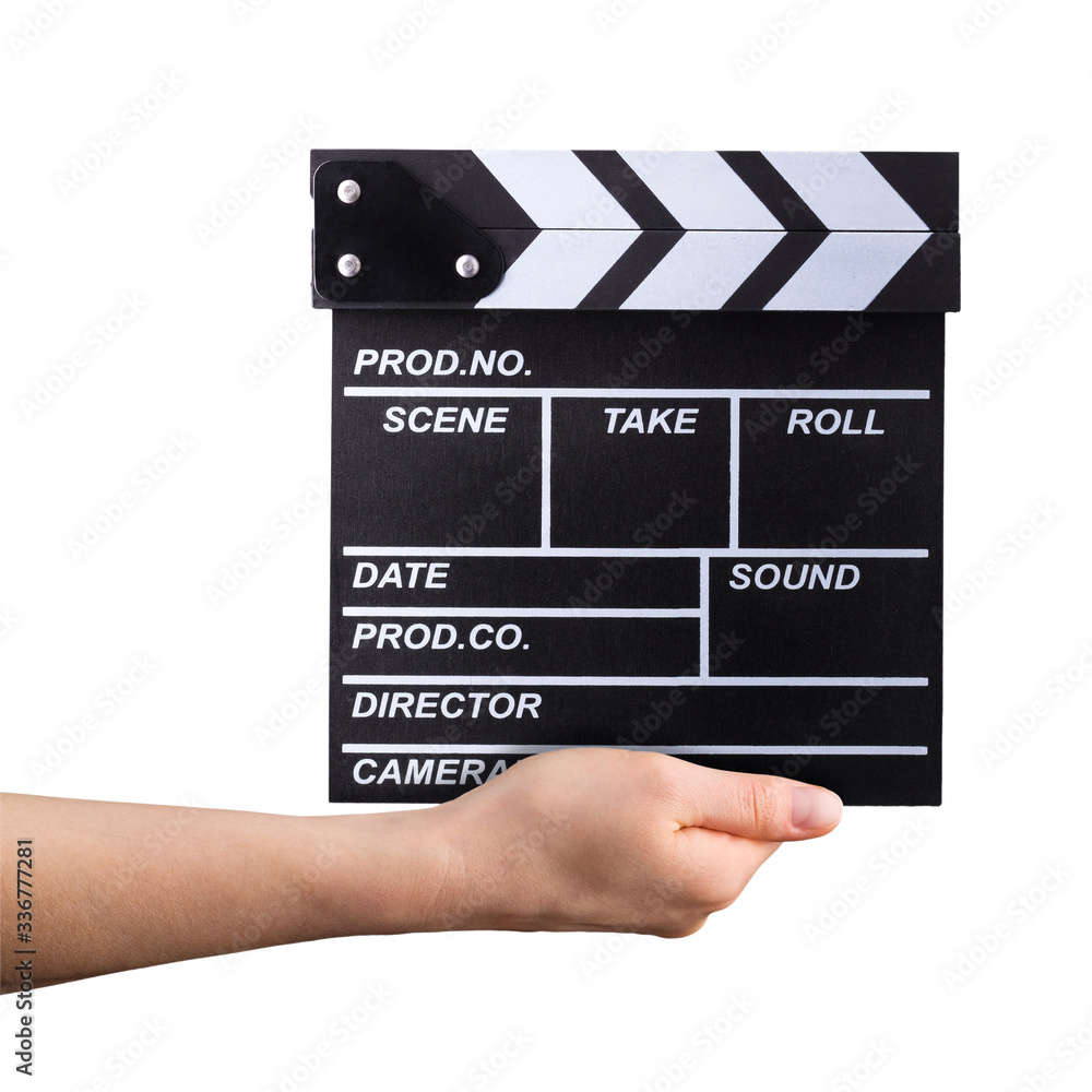 Human hand holding film clapper board isolated on white background