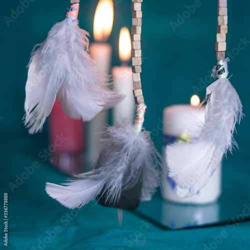 DREAM CATCHER FEATHERS WITH CANDLES AND GREEN TABLECLOTH 2