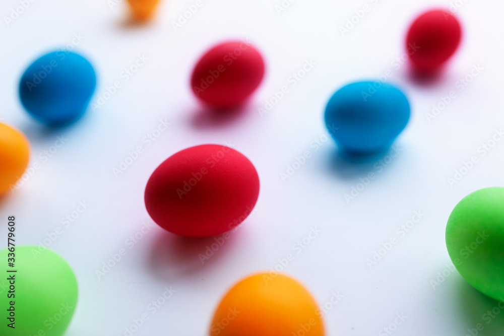 Vibrant multicolored Easter eggs on a white background Vibrant multicolored Easter eggs on a white background