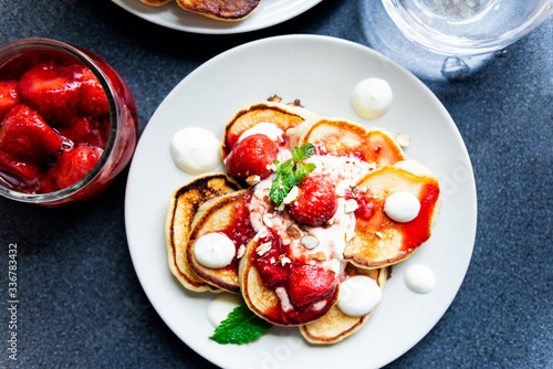 Pancakes with yogurt and strawberry jam