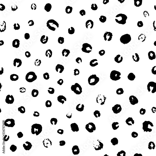 Abstract ink prints seamless pattern. Repeat backdrop of inky blots similar to viruses or bacteria. Black formless round shapes randomly placed on white background. EPS8 stock vector illustration.