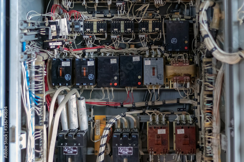 Electronic industry. Open cabinet of the control unit of the production cycle. Close-up.