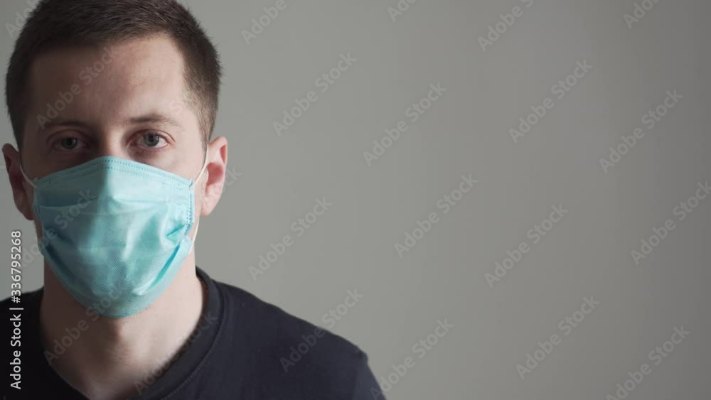 Portrait of young man wearing the protective mask during the pandemic covid19. 