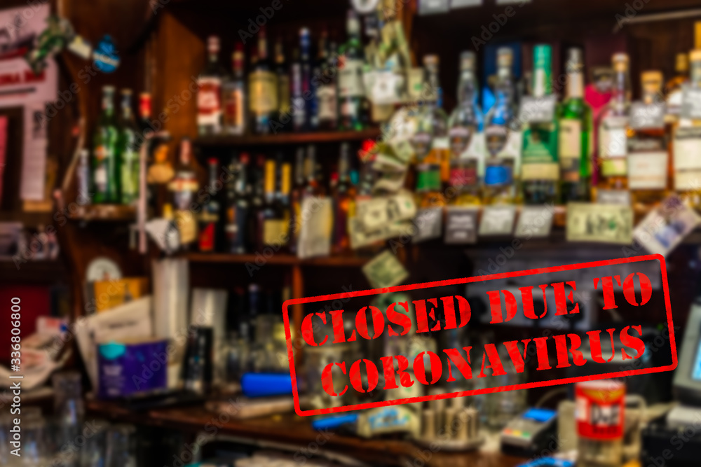 Defocused, blurred view of interior of traditional bar or pub, empty and closed due to coronavirus or covid 19 pandemics Defocused, blurred view of interior of traditional bar or pub, empty and closed due to coronavirus or covid 19 pandemics