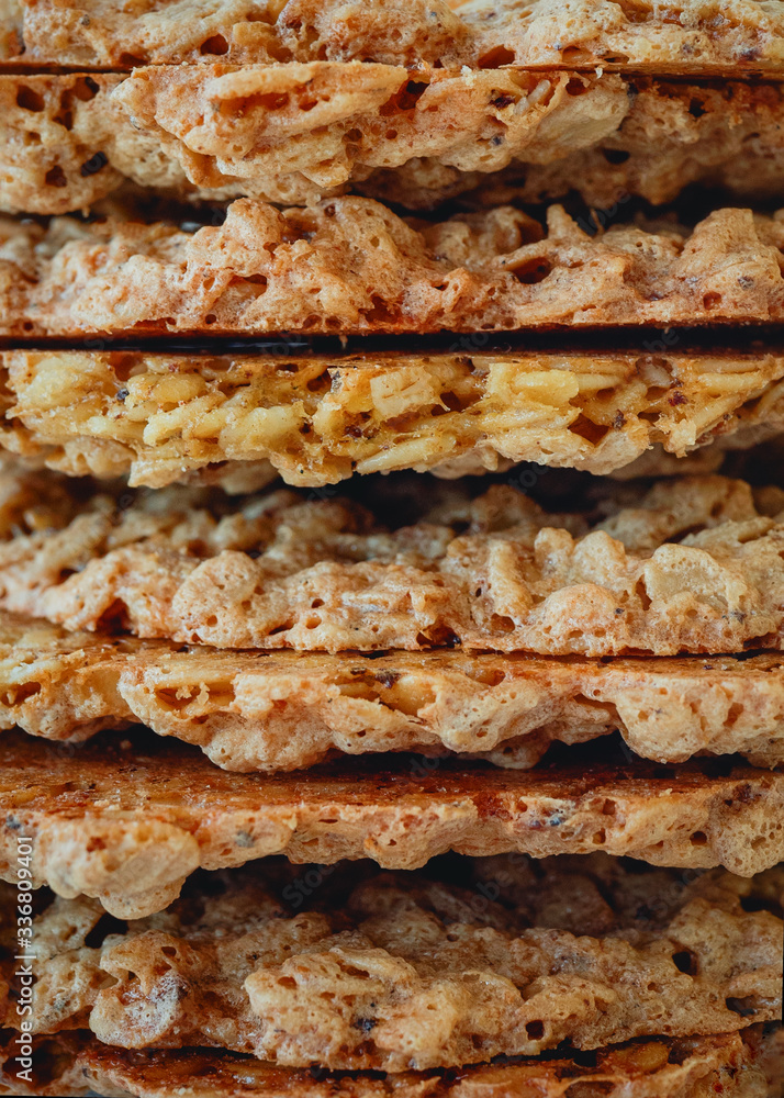 Closeup of a stack of homemade oatmeal cookies