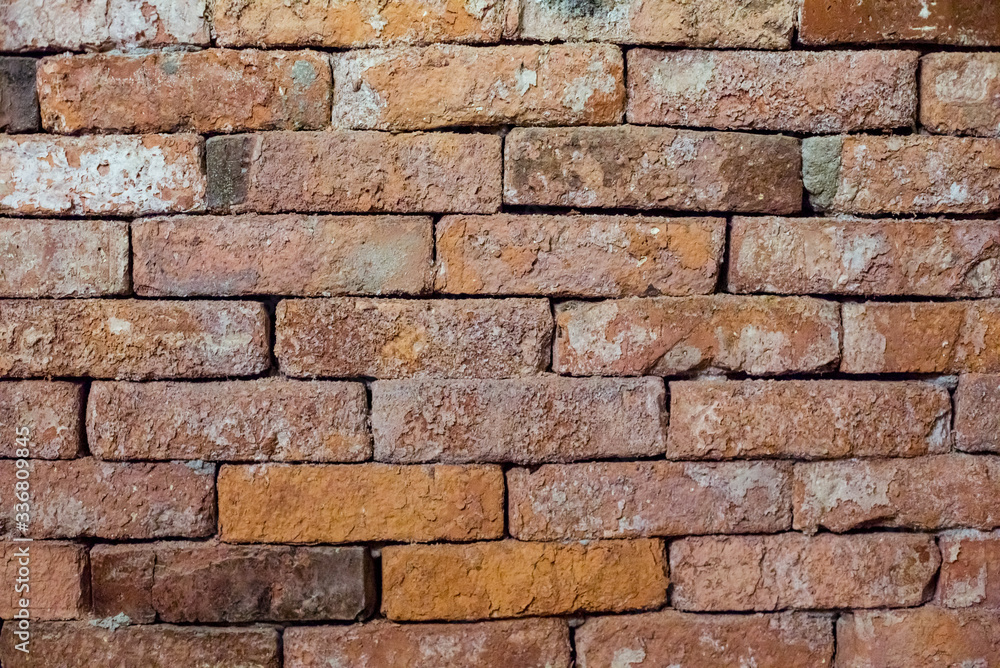 Fototapeta premium Brick wall high resolution, Abstract pattern on black backdrop. Old brick red color wall.