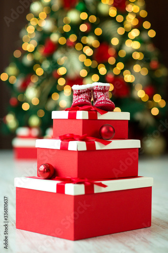 little children ears lie on a pyramid of gifts photo