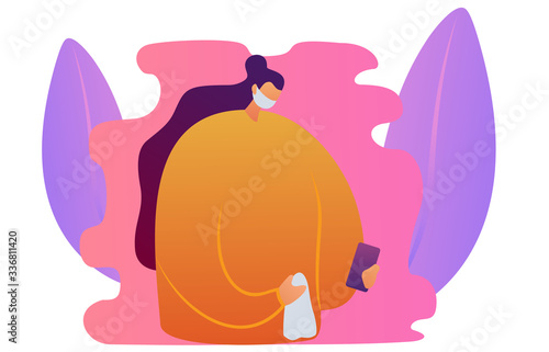Female with mask clearing her mobile phone
