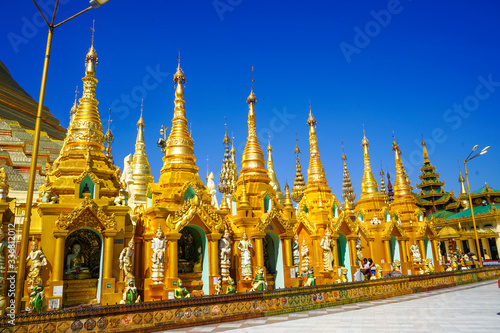 Amazing golden temples near Shwedagon Pagoda in Yangon. The most important buddhist s pagoda in Myanmar.