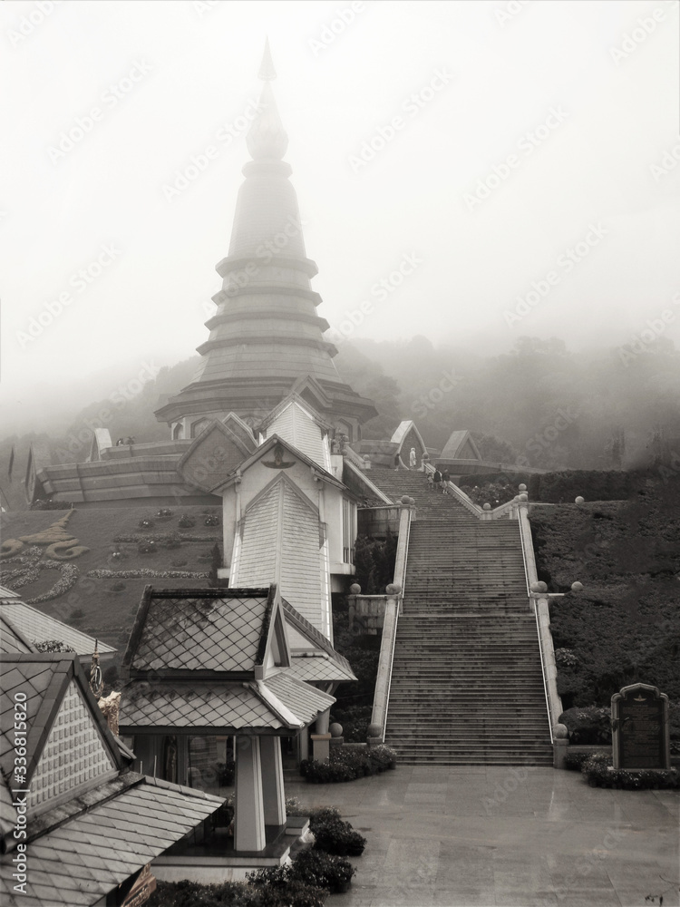 Foggy buddhist temple in Thailand in black and white