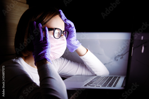 Cuadro en lienzo Woman in medicine mask and latex gloves reading news in social media on notebook, feeling panic about covid-19 coronavirus