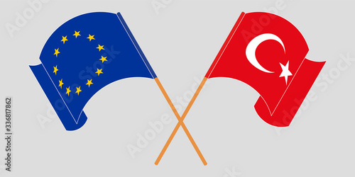 Crossed and waving flags of Turkey and the EU