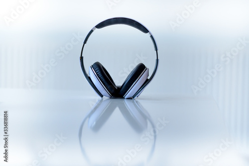 White Headphones on white background