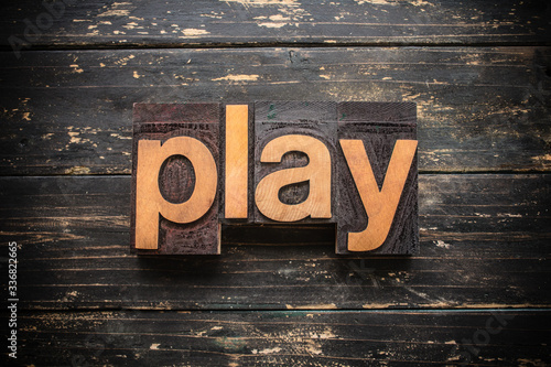 Play Concept Vintage Wooden Letterpress Type Word photo