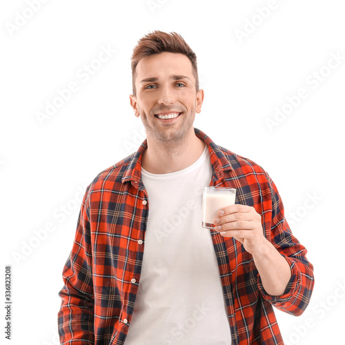Young man with milk on whit...