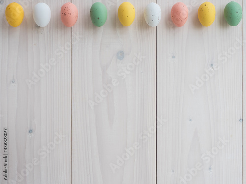easter eggs on wooden board.