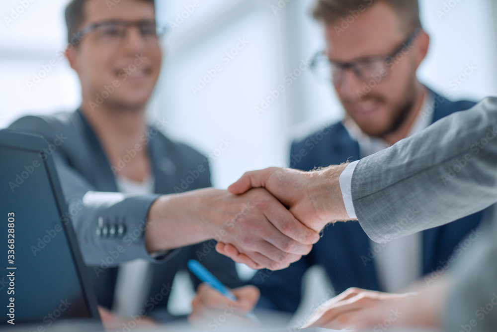 close up. strong handshake of business people . close up. strong handshake of business people .