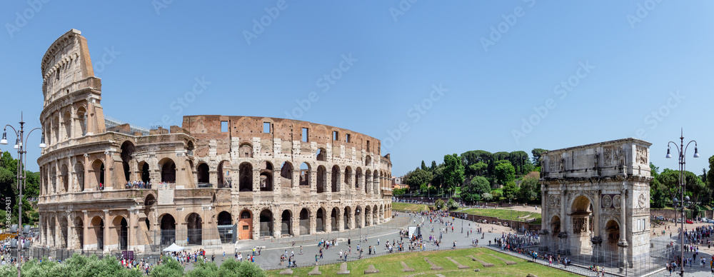 Panoramic of the Colosseum and Triumphal Arch of Constantine - Rome, Italy.