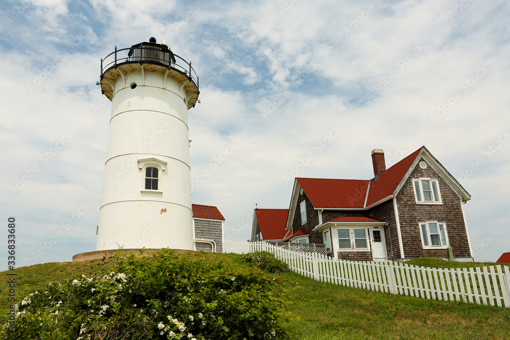 Nobska lighthouse at Cape Cod on a cloudy day. Nobska Light,  is a lighthouse located at Massachusetts on the southwestern tip of Cape Cod, 