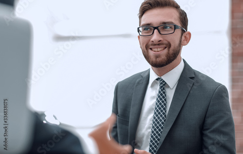Portrait of a group of business men working together at a meetin
