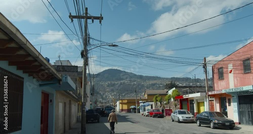 Xela Quetzaltenango Downtown streetview with older gentleman walking by