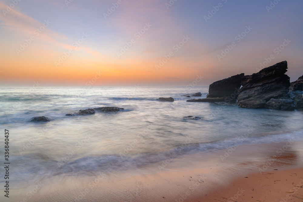Soft Sunrise Seascape with some light cloud