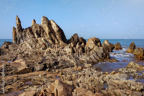 Sharp stone reefs protruding from the sea, a danger to sea ships and vessels.