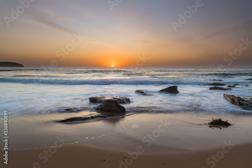 Soft Sunrise Seascape with some light cloud