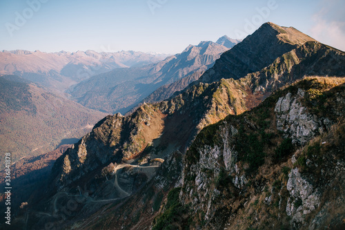 Sochi, Krasnaya Polyana. View of the Caucasus mountains. Serpentine road on the top