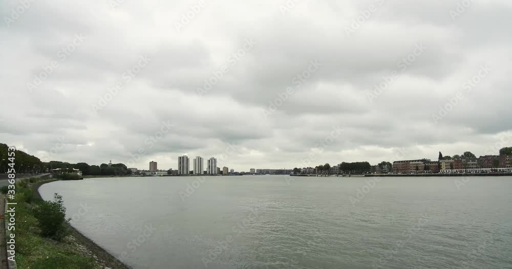 Canal River view on Rotterdam Netherlands Iconic Bridge amazing scene boats and cargo vessels are moving from place to place day time sea view Canal River view on Rotterdam Netherlands Iconic Bridge amazing scene boats and cargo vessels are moving from place to place day time sea view