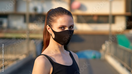 Woman wears a black mask to protect herself from the covid-19 coronavirus in Bangkok, Thailand.