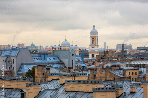 Beautiful top view of the historical center of St. Petersburg, the roofs of buildings and the bell tower of Vladimir Cathedral. Saint-Petersburg, Russia.