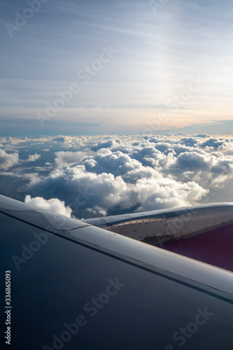 View from an airplane window of clouds © Ernest