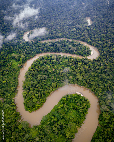 Aerial winding S bend river in Amazon rainforest photo