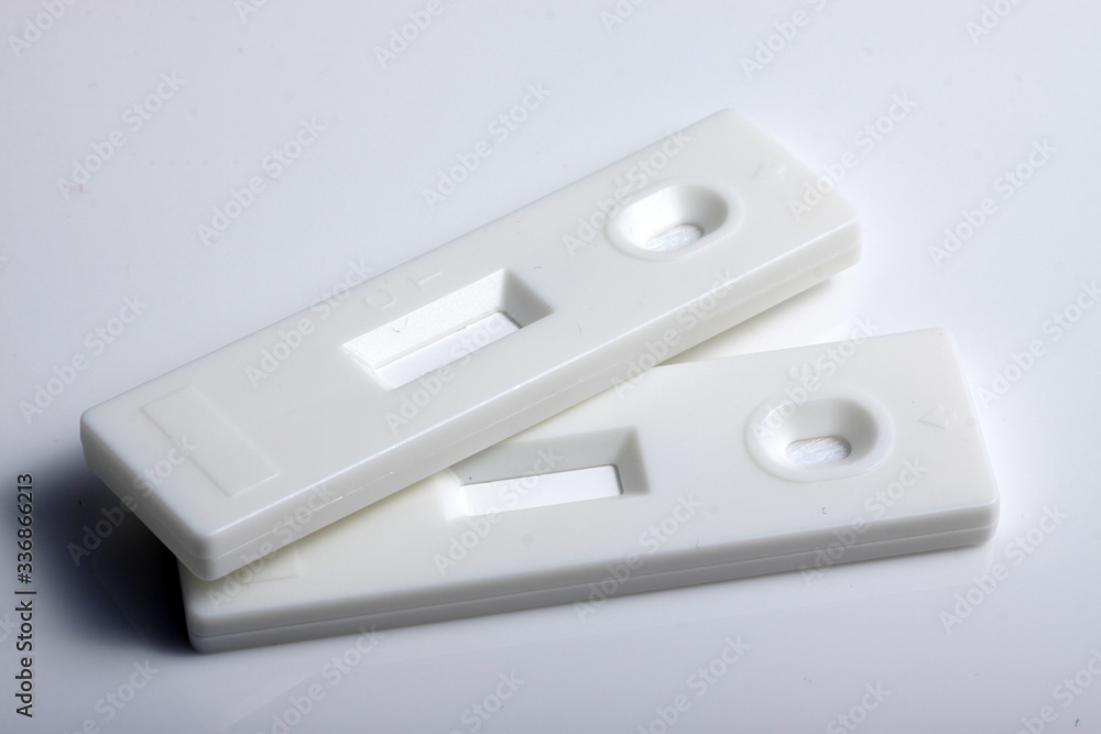 Close up shot of white rapid test cassette that used for medical screening purpose Close up shot of white rapid test cassette that used for medical screening purpose