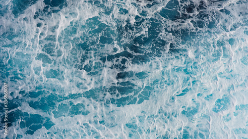 Blue foam ocean surface, water texture