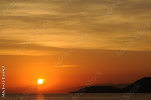 The sunrise view from beach of kenawa island, Lombok - Indonesia photo