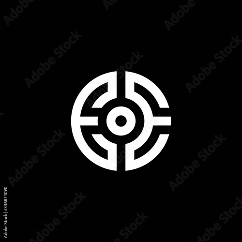 EE monogram logo with abstract circle style and dot in the middle