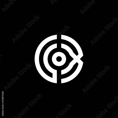 UX monogram logo with abstract circle style and dot in the middle