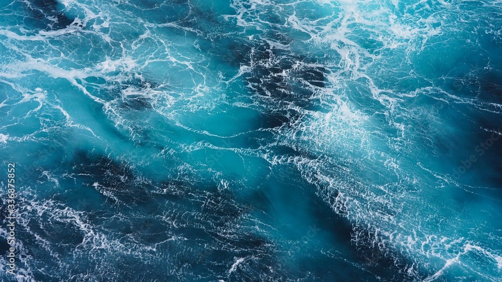 Abstraction of sea foam in the ocean. Dark water, storm waves Abstraction of sea foam in the ocean. Dark water, storm waves