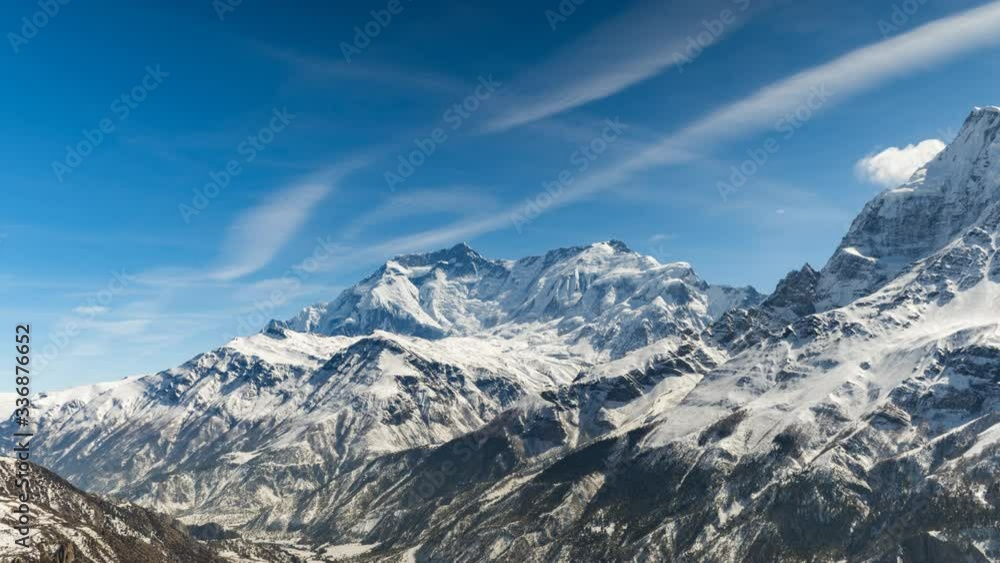 Annapurna Two Mountain Day Timelapse overlooking the valley with moving clouds. Wide Shot From Manang Valley Annapurna Two Mountain Day Timelapse overlooking the valley with moving clouds. Wide Shot From Manang Valley