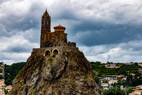 Saint-Michel d  Aiguilhe rock with the Chapel in Puy-en-Velay town. Haute-Loir  Auvergne-Rhone-Alpes region in France.