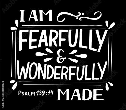 Hand lettering I am fearfully and wonderfully made on black background.