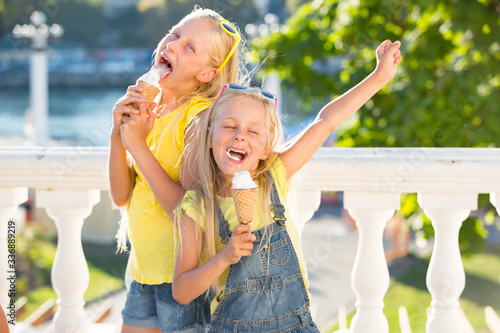 Kids eating ice cream outdoors