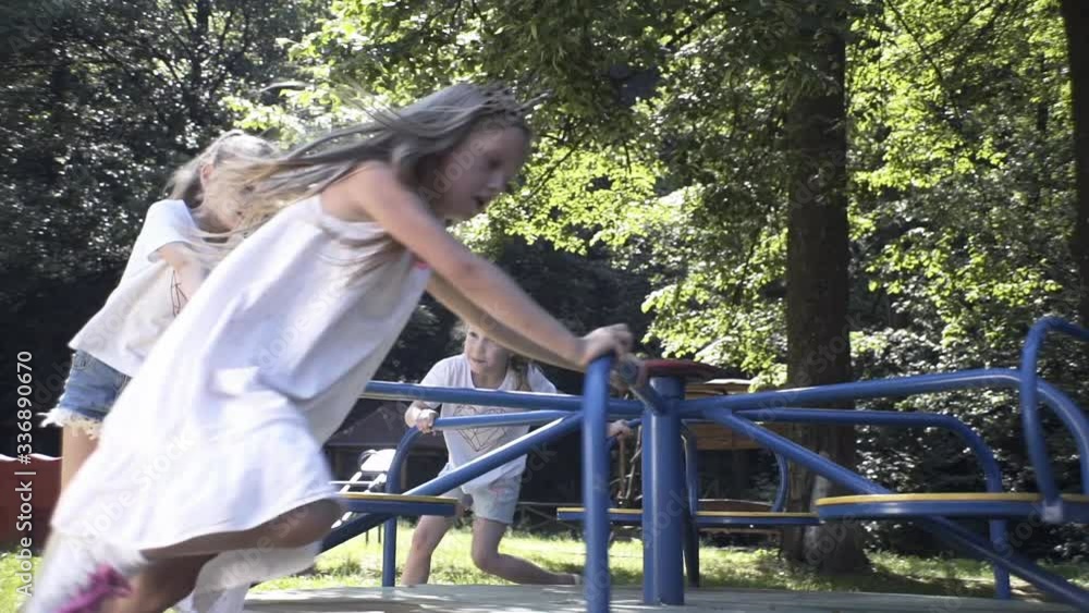 Children play different games outdoors. Children have fun together in the fresh air. Happy kids love to play in the playground Children play different games outdoors. Children have fun together in the fresh air. Happy kids love to play in the playground