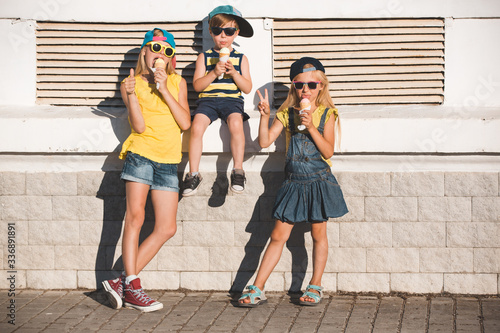 Kids eating ice cream outdoors